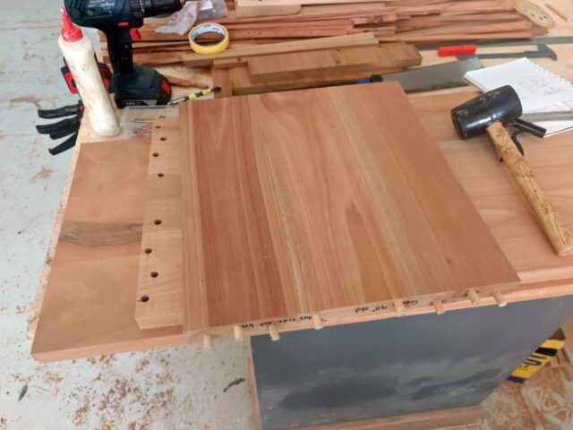 Dowel joinery process on solid melunak wood furniture, no visible screw holes